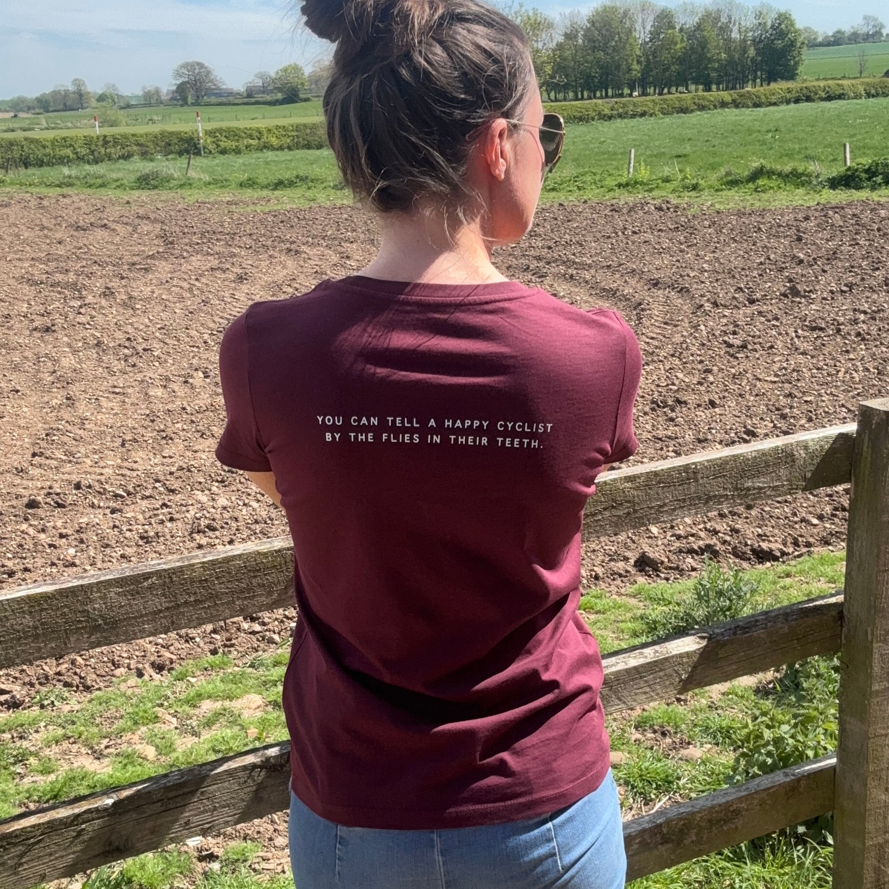 Women's "You can tell a happy cyclist by the flies in their teeth" Back print T-Shirt