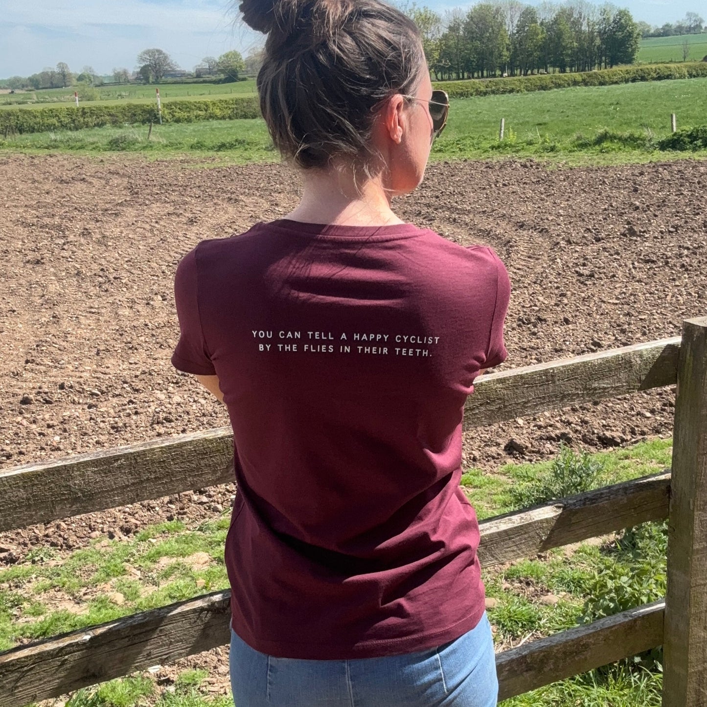 Women's "You can tell a happy cyclist by the flies in their teeth" Back print T-Shirt